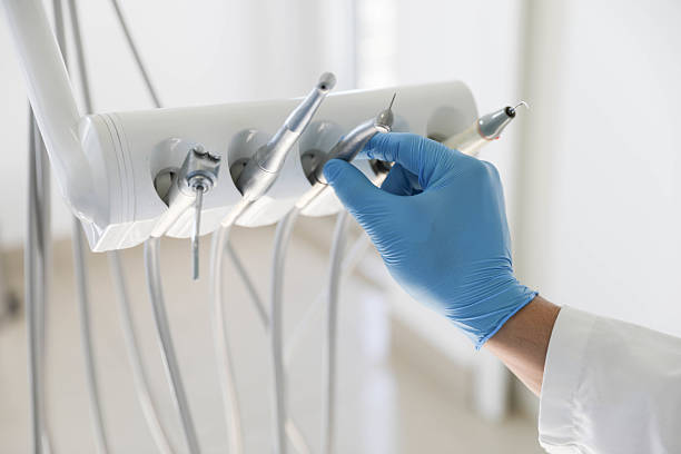 Professional Tooth Extraction technician working in Chanute, KS